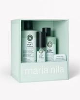 Maria Nila True Soft hair care set in a mint green gift box, featuring shampoo, conditioner, and an argan oil bottle.